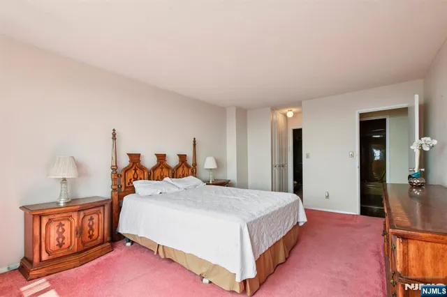 a bathroom with a sink a mirror and a shower