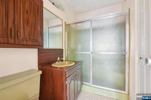 a view of an empty room and glass door