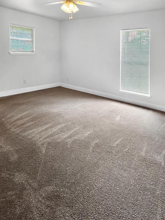 529 Celtic Road Howe, TX 75459 - Photo 6 of 16 an empty room with a empty space and windows