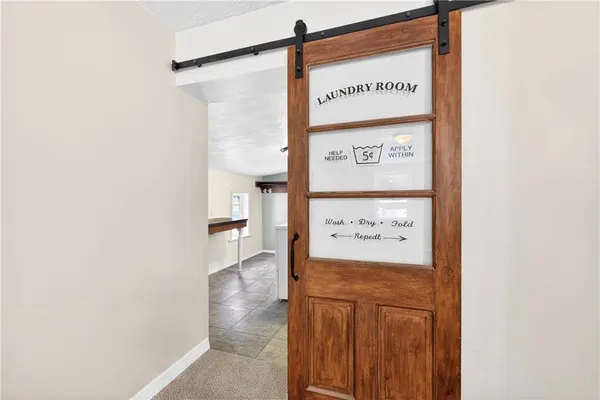 a view of utility room and utility room