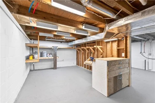 a utility room with cabinets