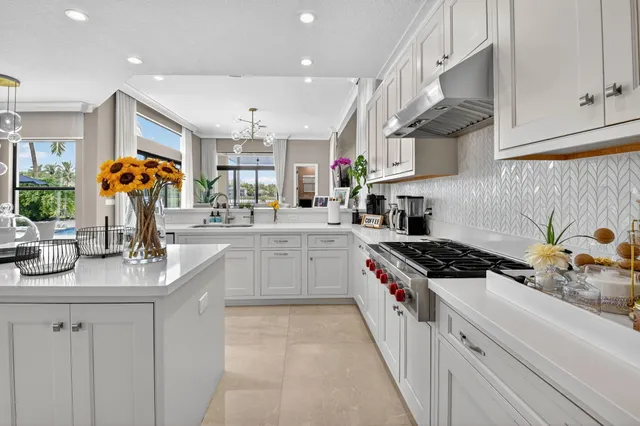 a view of a livingroom with workspace and a window