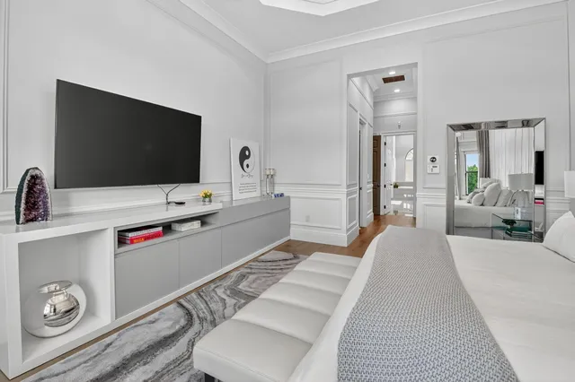 a backyard of a house with barbeque oven table and chairs