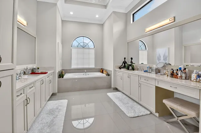 a view of an outdoor dining space with a table and chairs