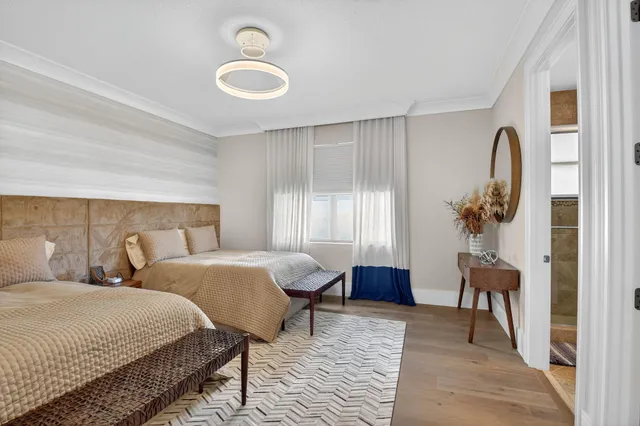 an aerial view of a house with a garden and outdoor space