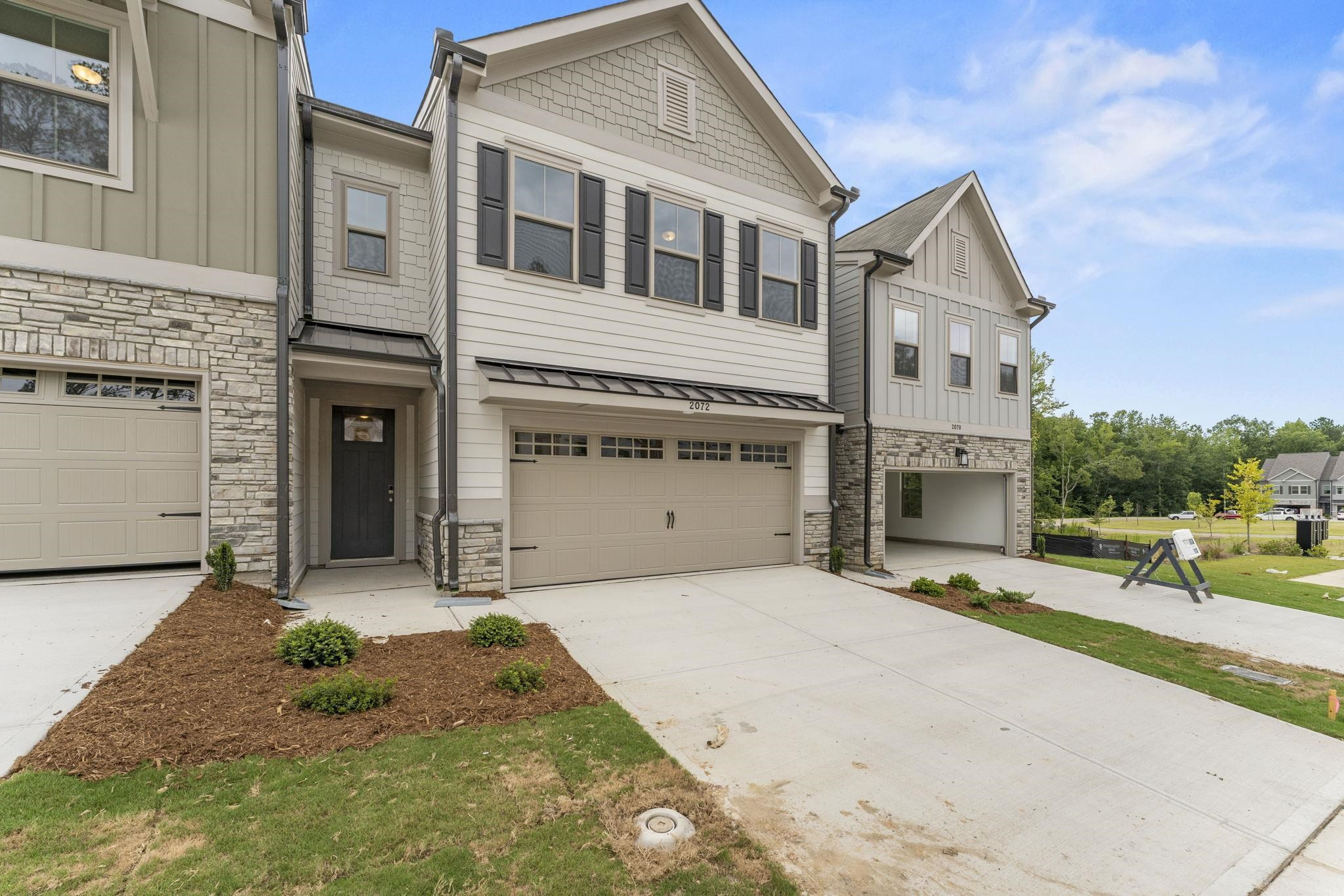 2128 Voekler Street Apex, NC 27502 - Photo 2 of 27 a front view of a house with a yard