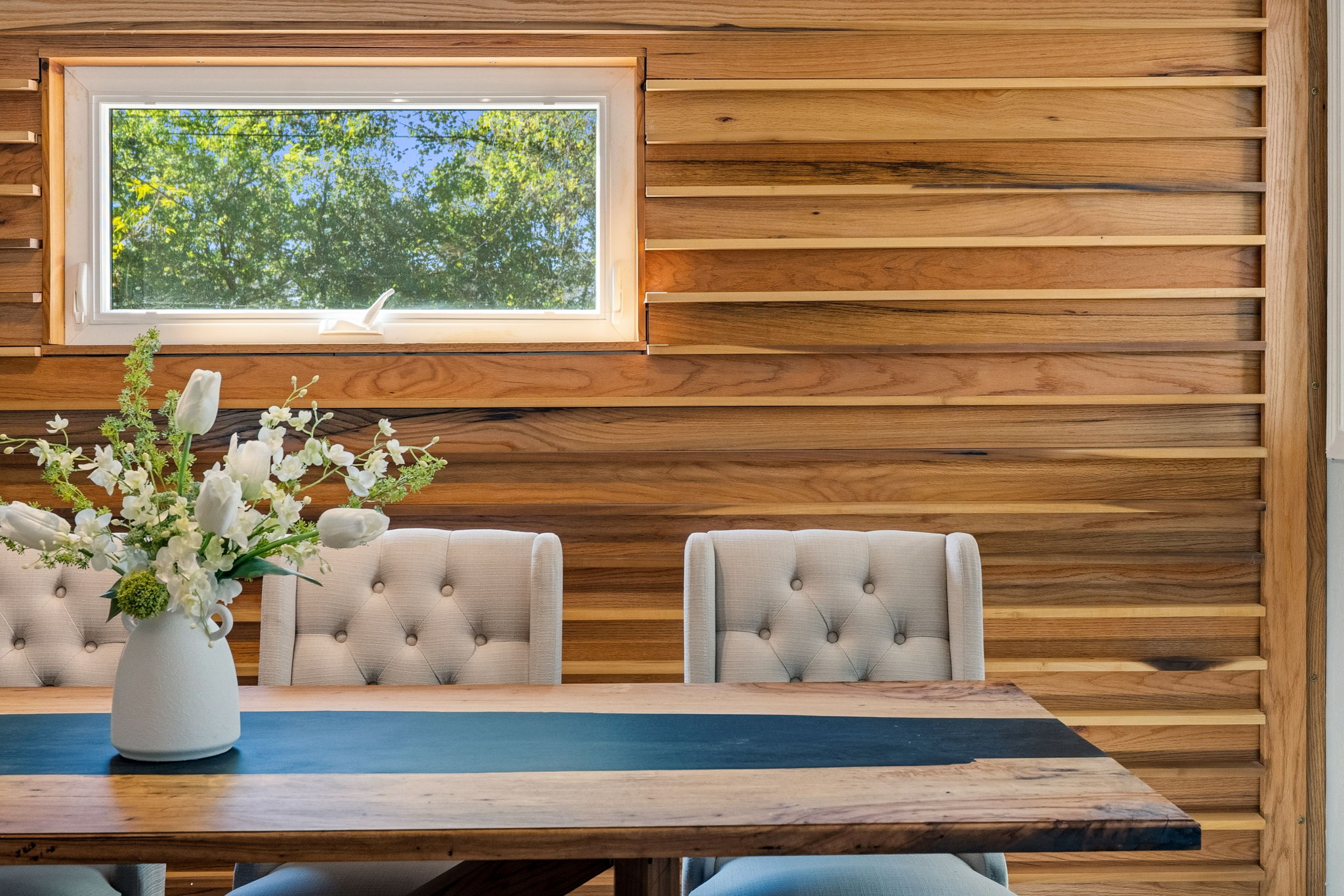 403 Gate Tree Lane Austin, TX 78745 - Photo 11 of 30 a vase of flowers sitting on a floor