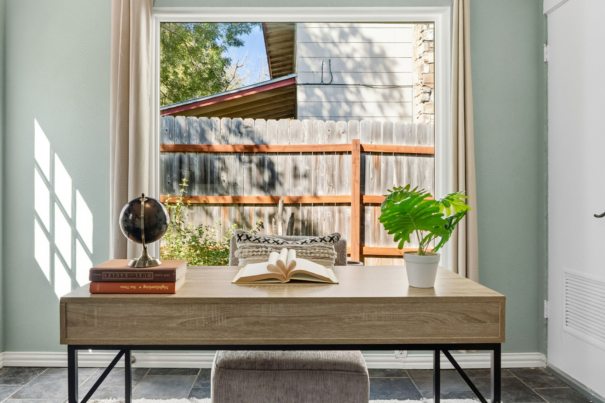 403 Gate Tree Lane Austin, TX 78745 - Photo 19 of 30 a view of a dining room with furniture and window