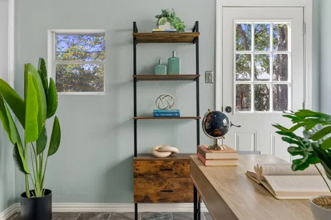 a table with a vase and a vase on it