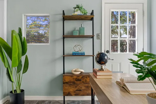 a table with a vase and a vase on it