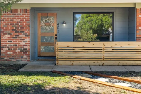 a view of a porch with a bench
