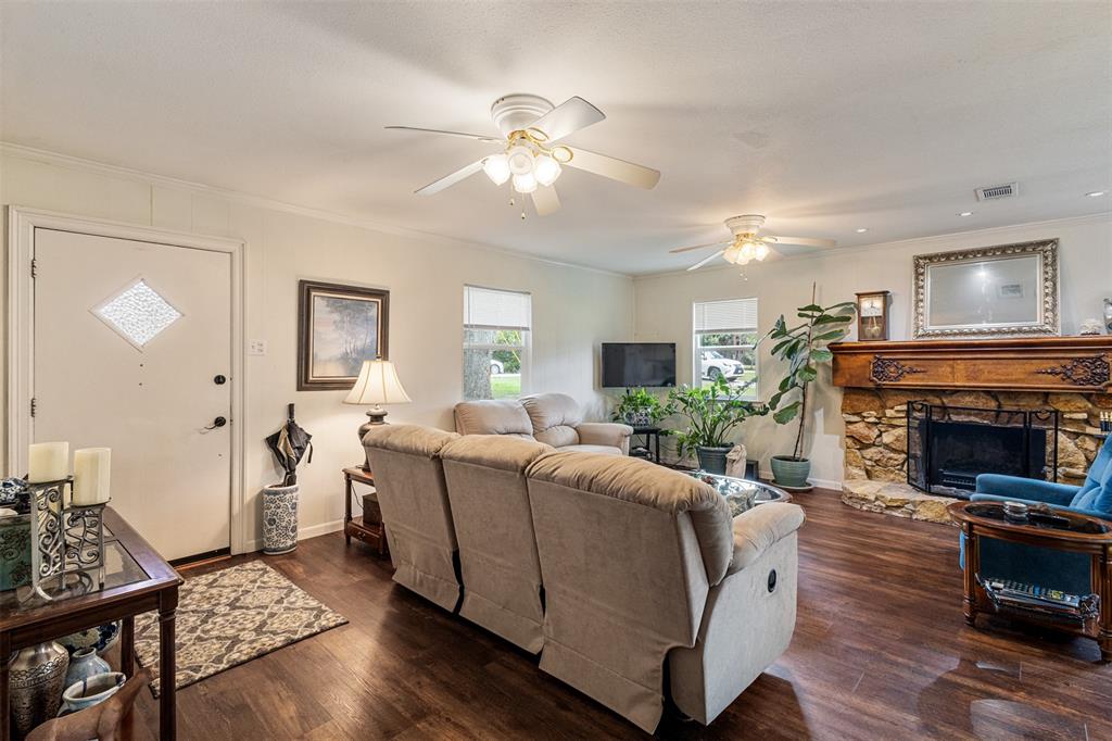 713 Midway Road Tool, TX 75143 - Photo 10 of 28 a living room with furniture and a fireplace