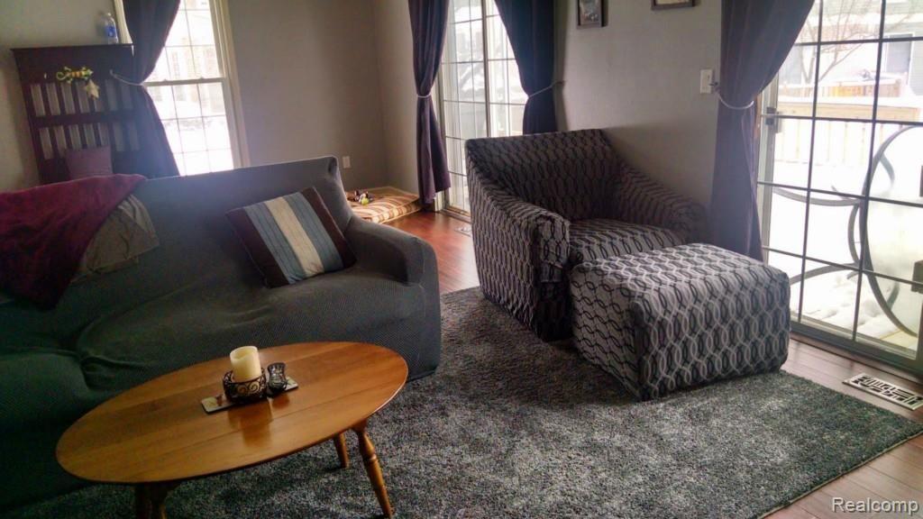 1213 Candlestick Lane, Unit 118 Rochester, MI 48306 - Photo 7 of 16 living room 2.jpg