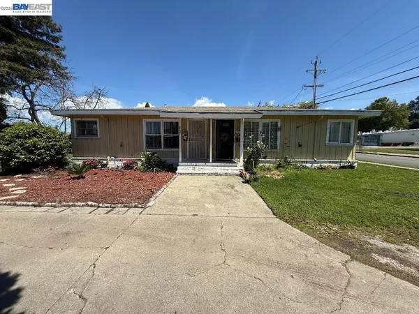 a front view of house with patio