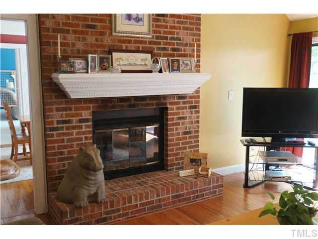 6404 Pernod Way Raleigh, NC 27613 - Photo 4 of 24 One of two fireplaces in this home.