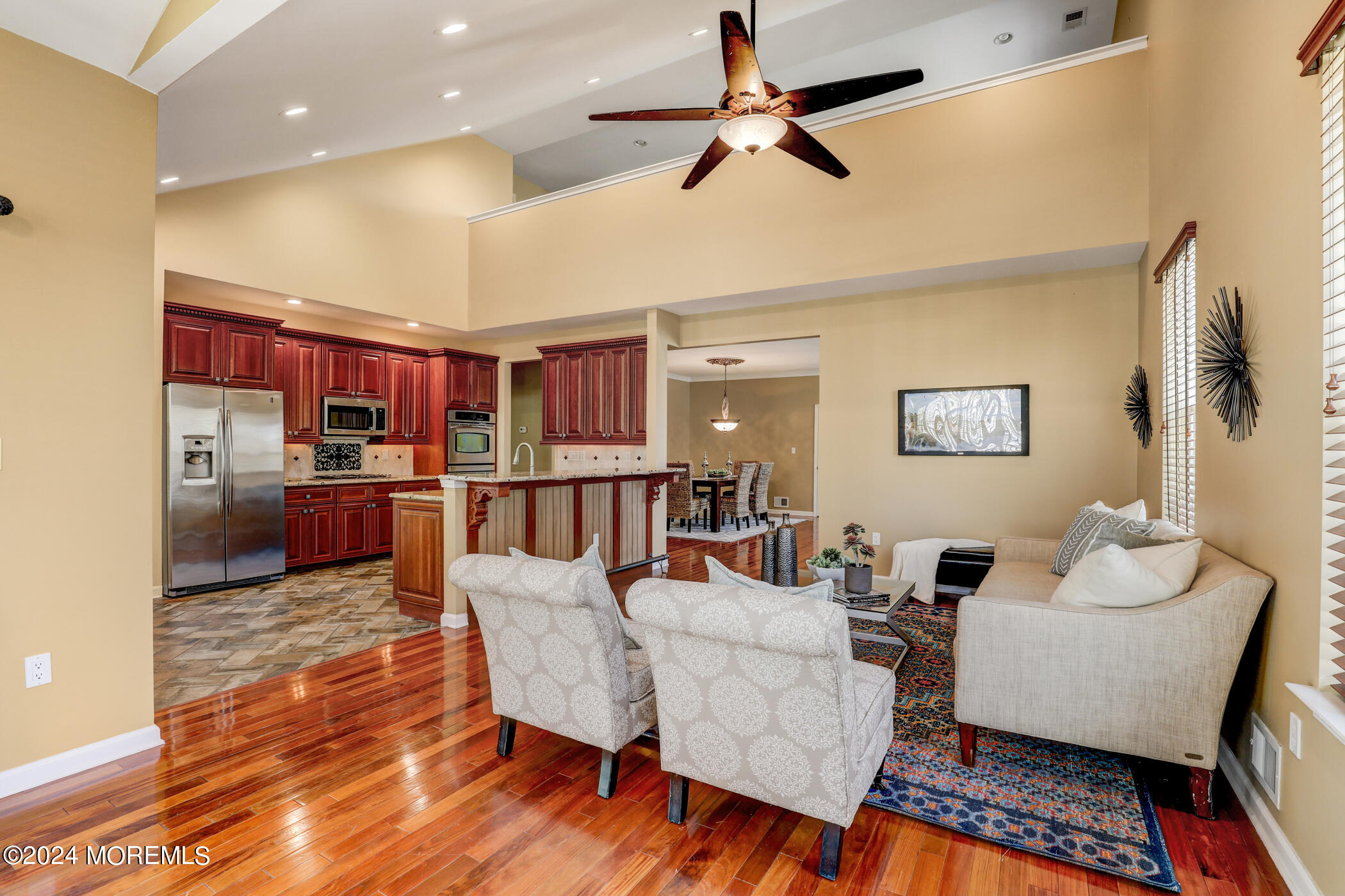 21 Hartack Road Manalapan, NJ 07726 - Photo 11 of 39 a living room with lots of furniture and kitchen view