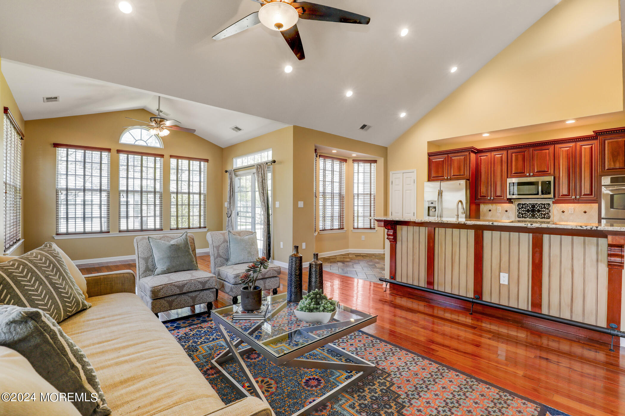 21 Hartack Road Manalapan, NJ 07726 - Photo 12 of 39 a living room with furniture and a large window