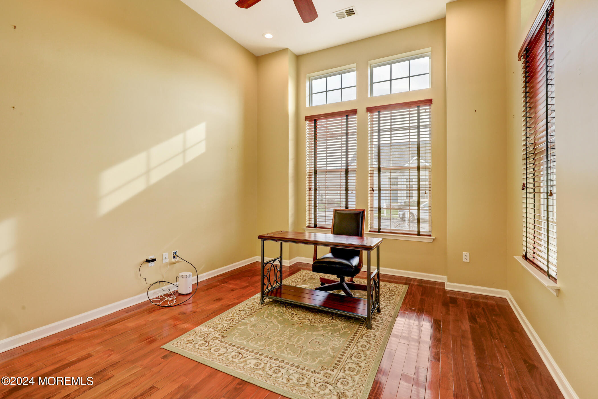 21 Hartack Road Manalapan, NJ 07726 - Photo 15 of 39 a living room with furniture and a window