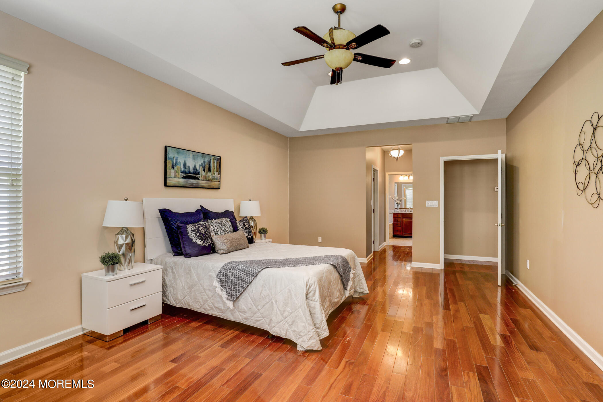 21 Hartack Road Manalapan, NJ 07726 - Photo 18 of 39 a bedroom with a bed and a chandelier