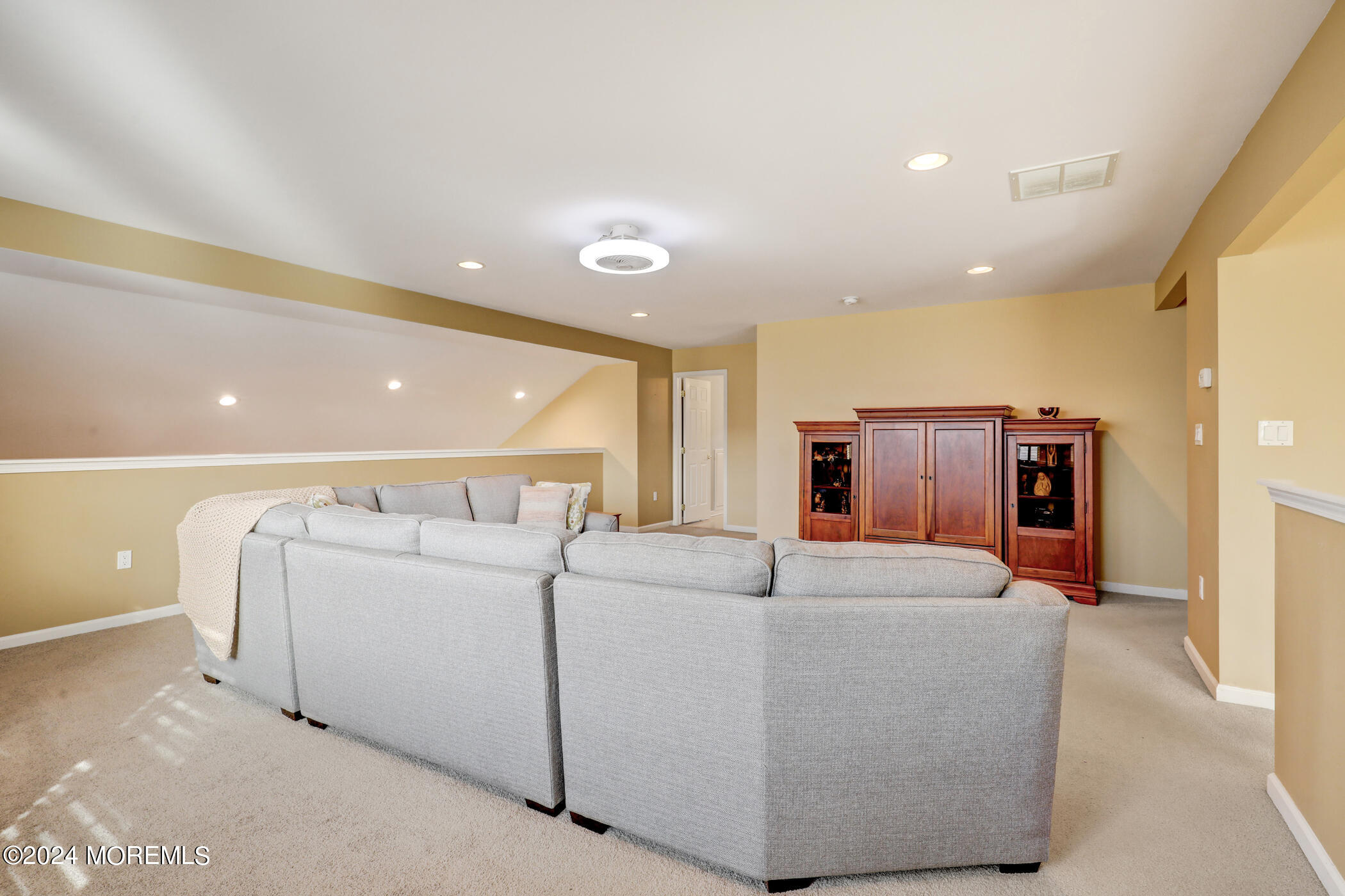 21 Hartack Road Manalapan, NJ 07726 - Photo 23 of 39 a living room with furniture and a table