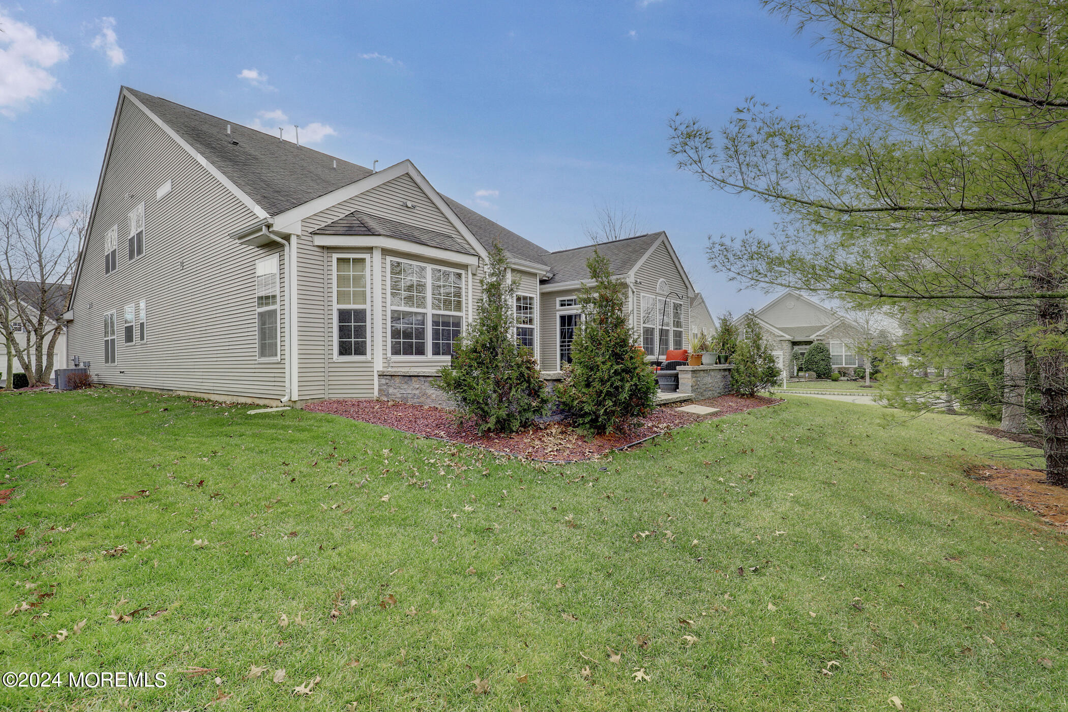 21 Hartack Road Manalapan, NJ 07726 - Photo 28 of 39 a front view of a house with garden