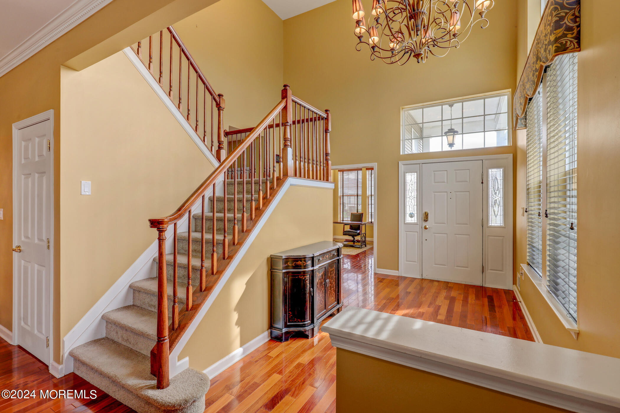 21 Hartack Road Manalapan, NJ 07726 - Photo 3 of 39 a view of an entryway with wooden floor and staircase