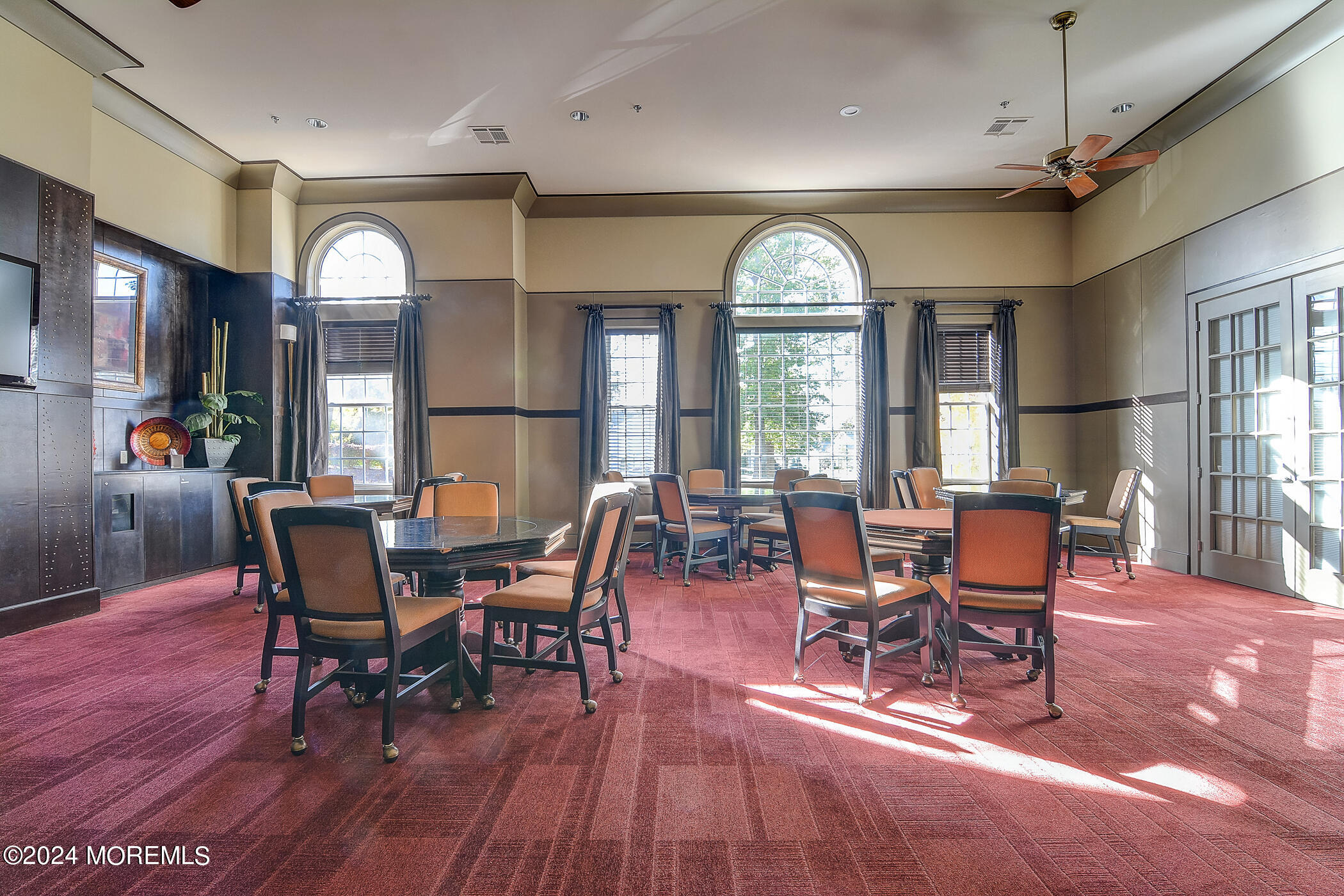 21 Hartack Road Manalapan, NJ 07726 - Photo 32 of 39 a view of a dining room with furniture window and wooden floor
