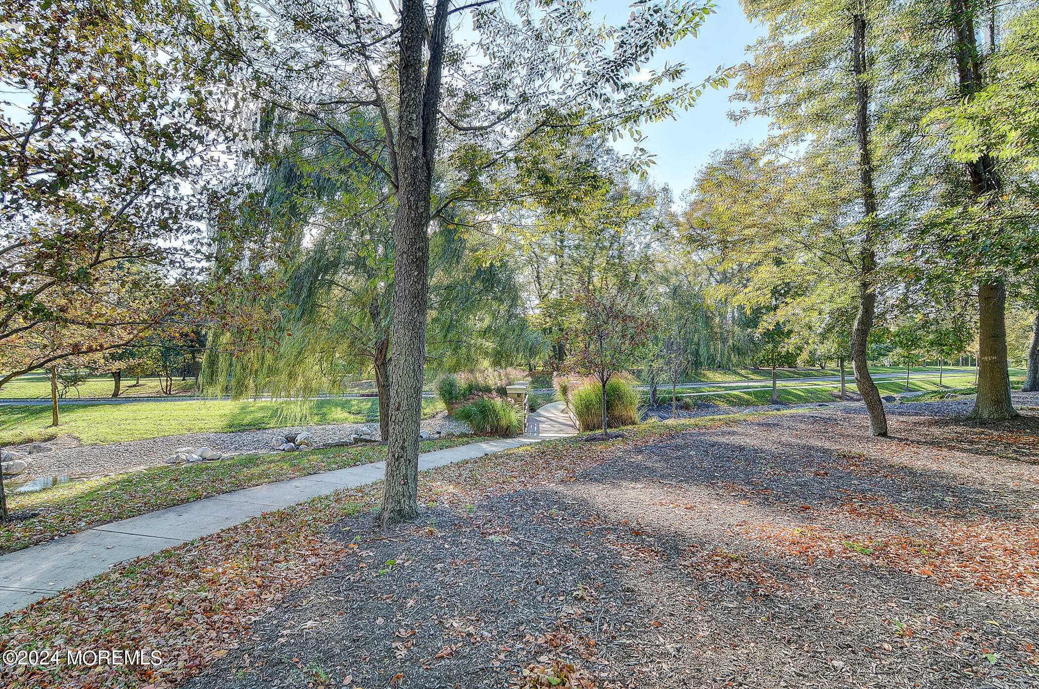 21 Hartack Road Manalapan, NJ 07726 - Photo 36 of 39 a view of a yard with tree s