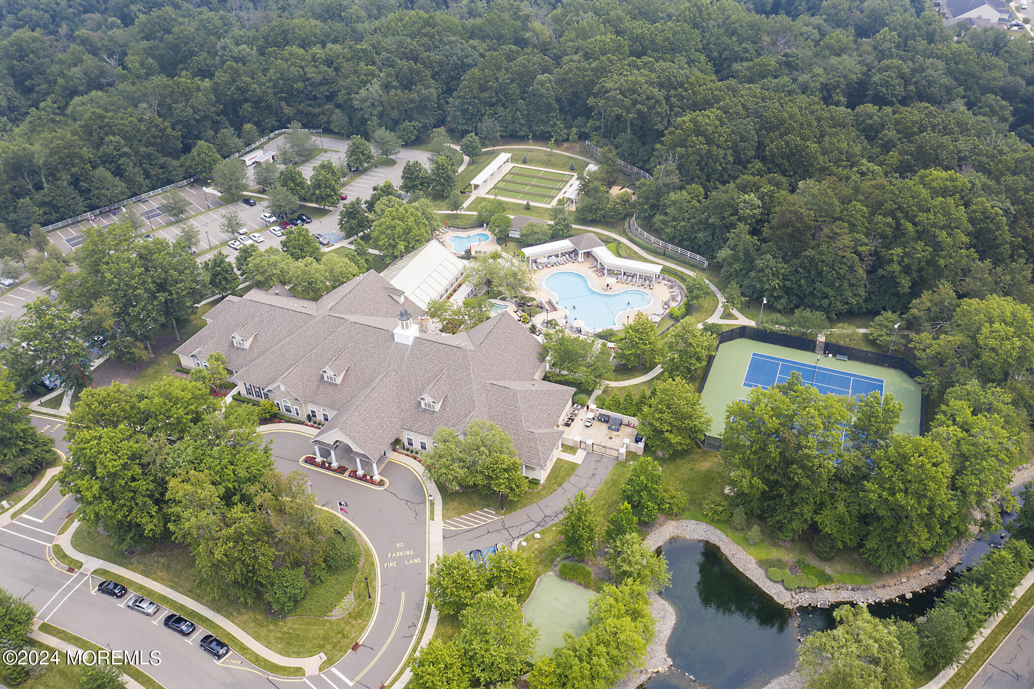 21 Hartack Road Manalapan, NJ 07726 - Photo 37 of 39 an aerial view of a house with yard swimming pool and outdoor seating