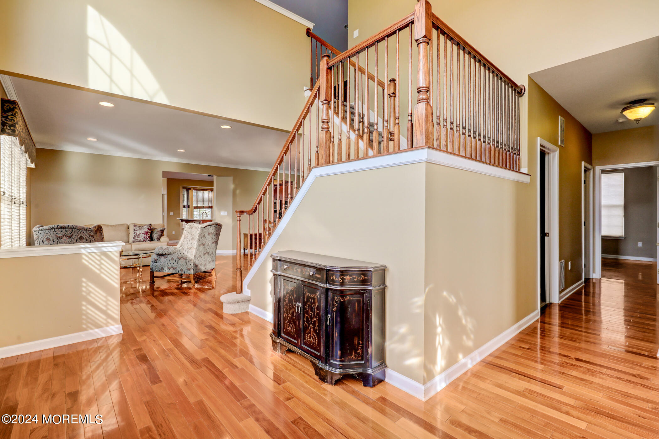 21 Hartack Road Manalapan, NJ 07726 - Photo 4 of 39 a living room with furniture floor to ceiling window and wooden floor