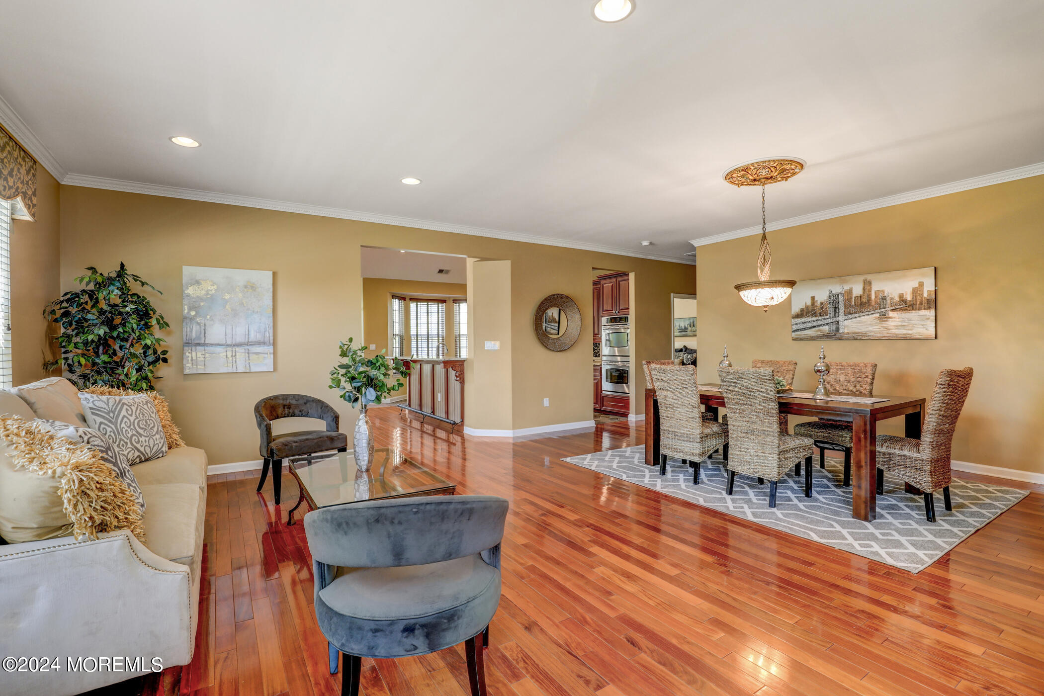 21 Hartack Road Manalapan, NJ 07726 - Photo 5 of 39 a view of a dining room with furniture and wooden floor