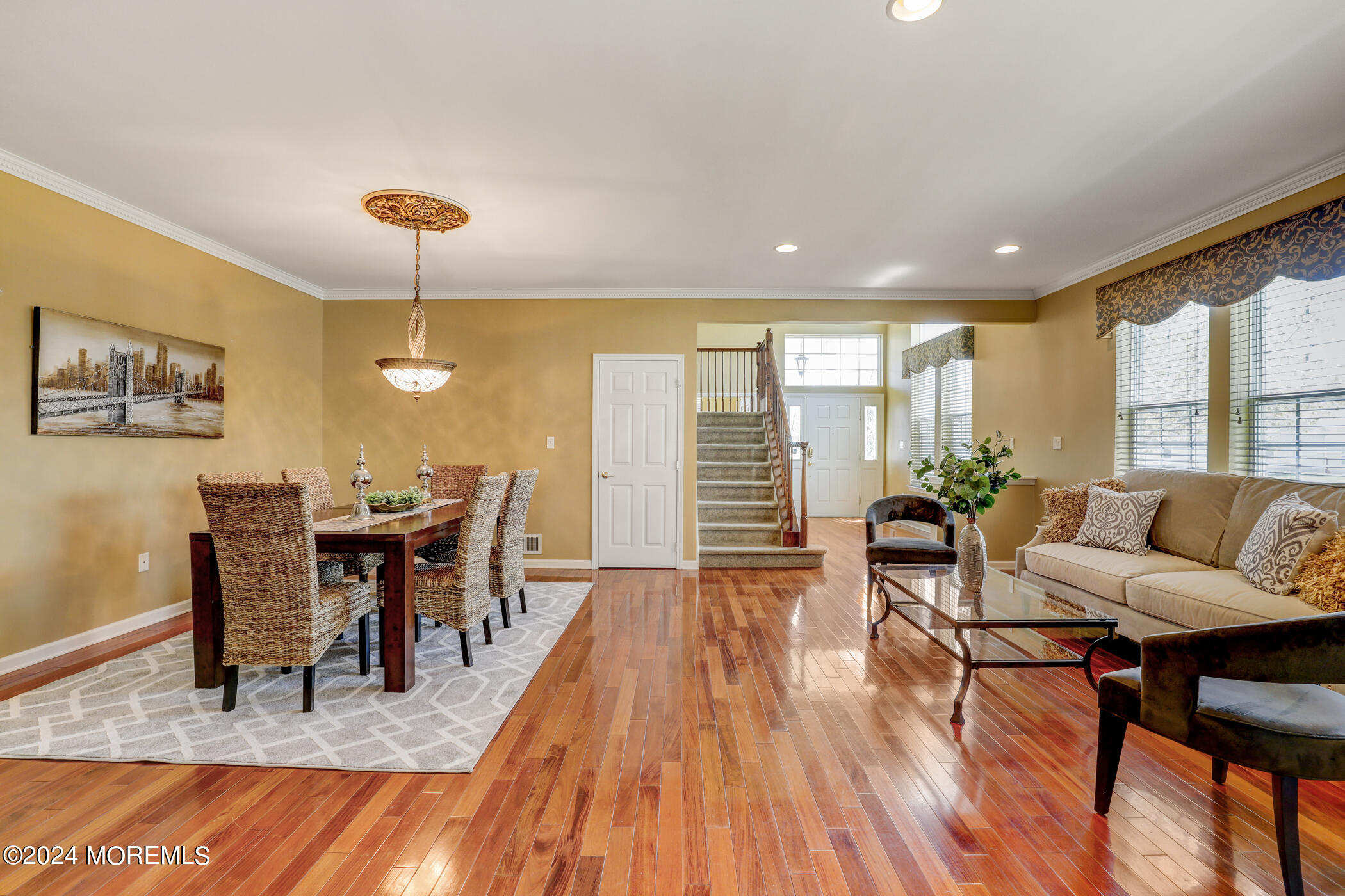 21 Hartack Road Manalapan, NJ 07726 - Photo 6 of 39 a view of a dining room with furniture window and wooden floor