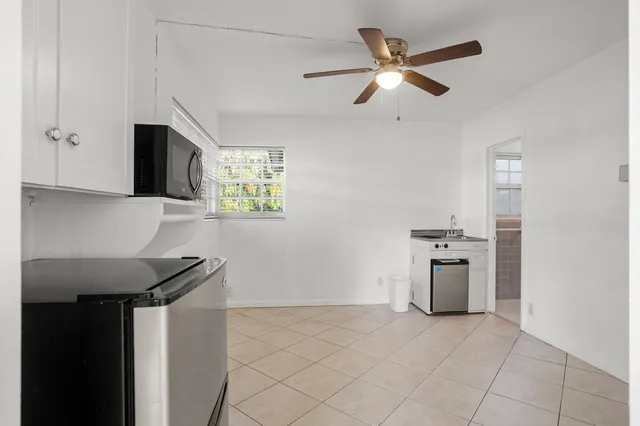 a view of kitchen with windows
