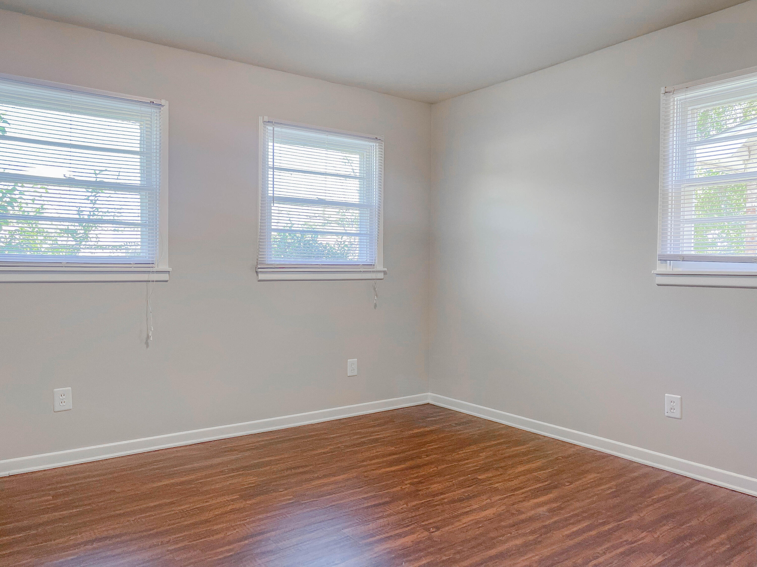 3419 53rd Street Lubbock, TX 79413 - Photo 11 of 11 a view of a room with wooden floor and windows