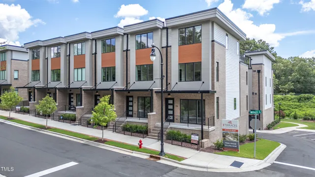a front view of a building with street view
