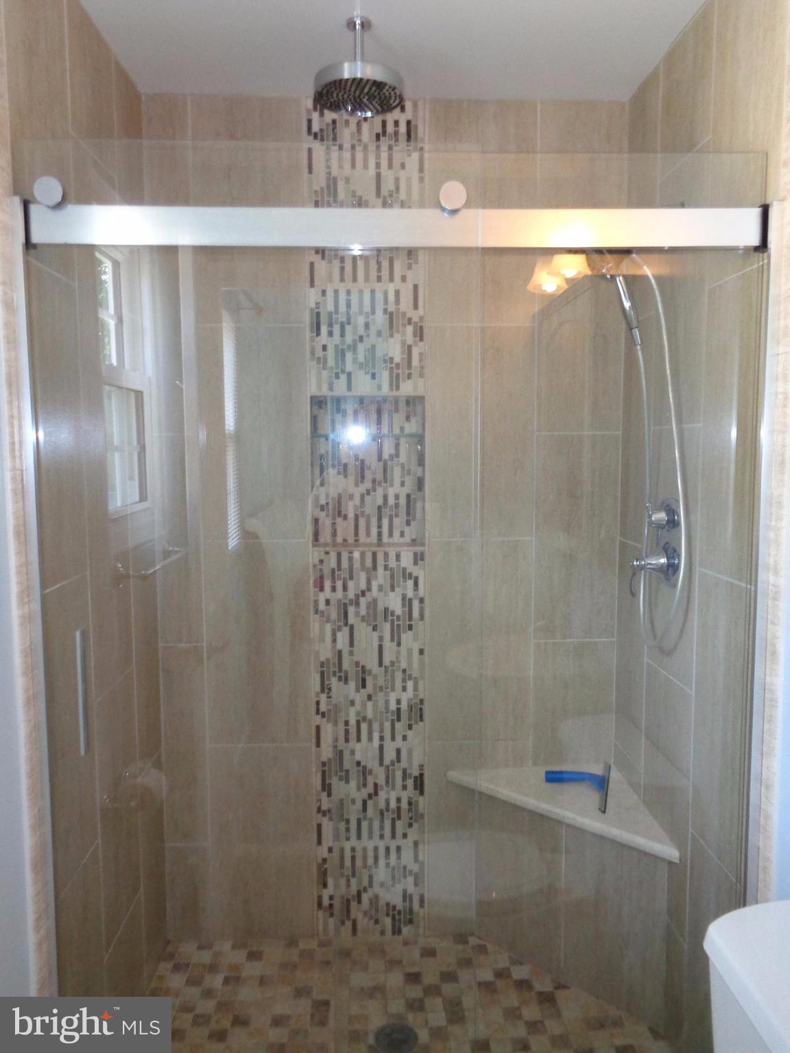 246 Arundel Road Pasadena, MD 21122 - Photo 11 of 27 Custom rain shower with seamless glass door