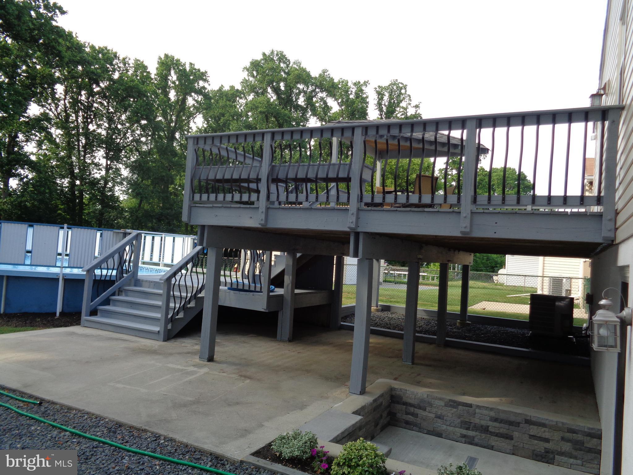246 Arundel Road Pasadena, MD 21122 - Photo 14 of 27 Huge deck and patio, let the fun begin