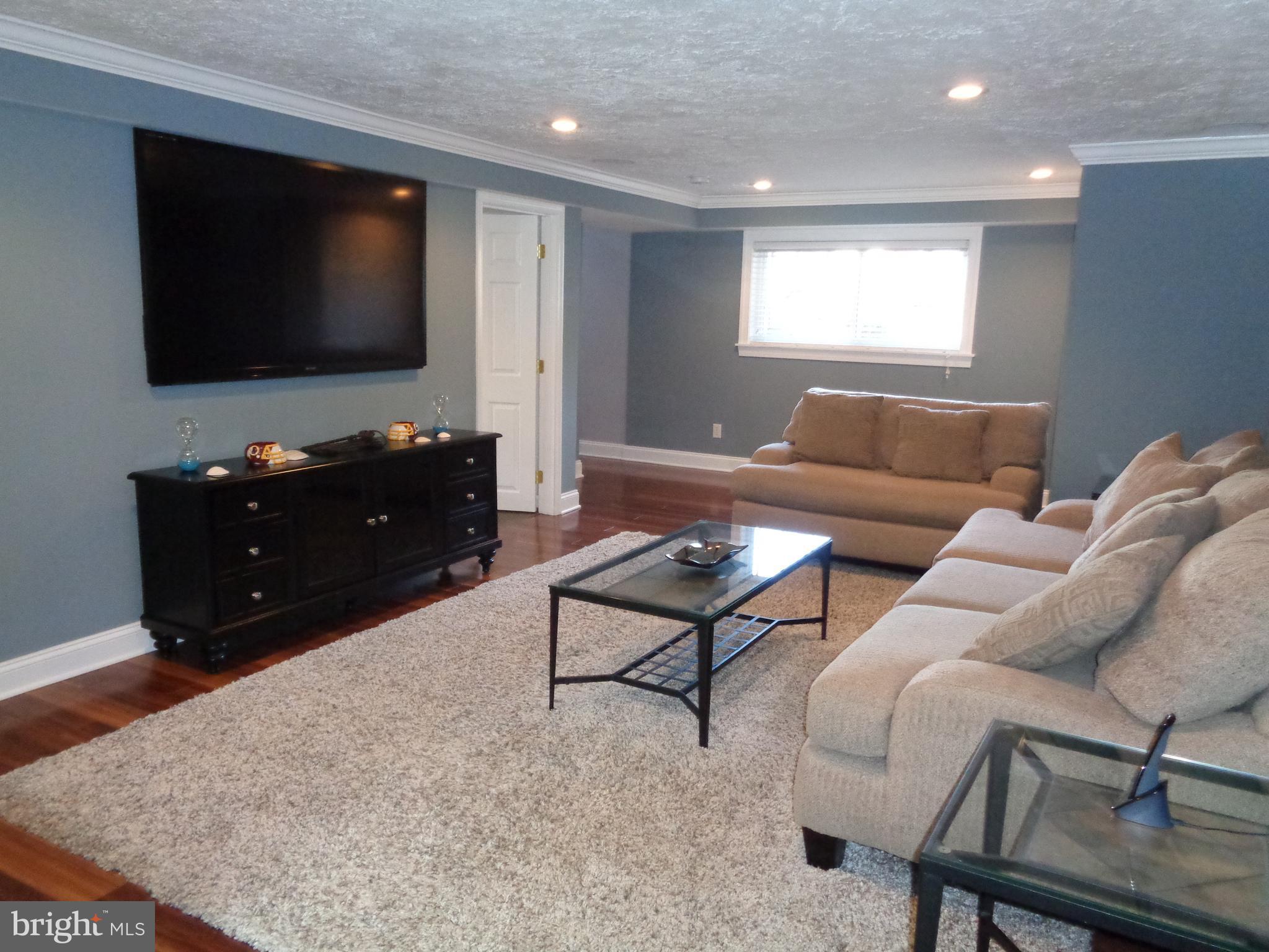 246 Arundel Road Pasadena, MD 21122 - Photo 17 of 27 Gleaming engineered wood floors just installed