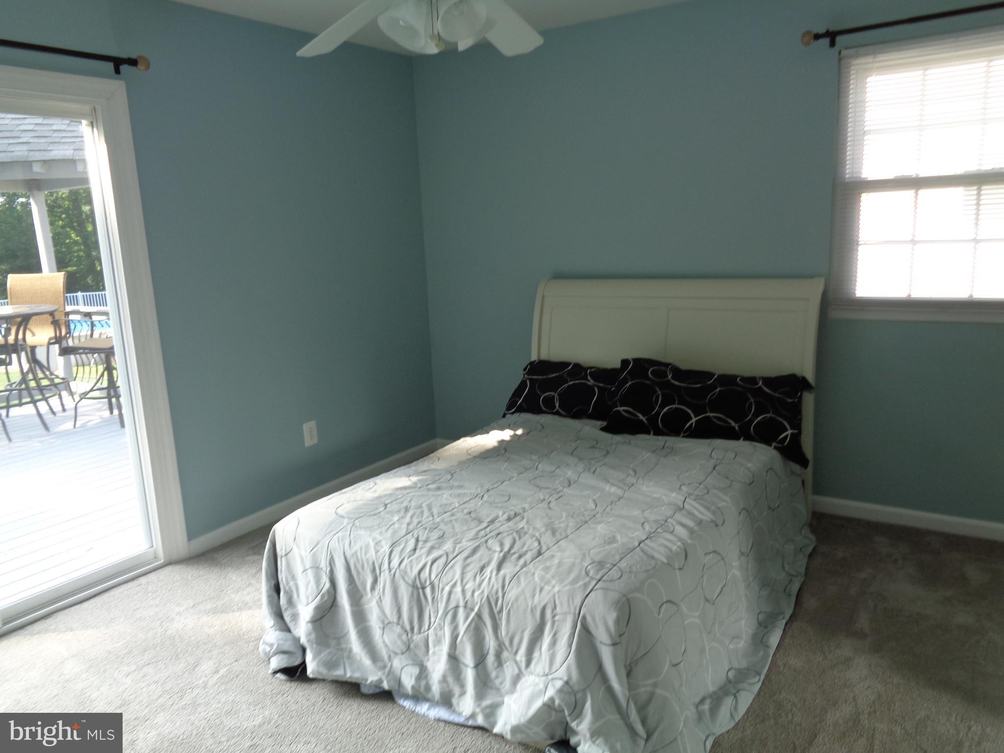 246 Arundel Road Pasadena, MD 21122 - Photo 9 of 27 New carpet and sliding door and access to deck
