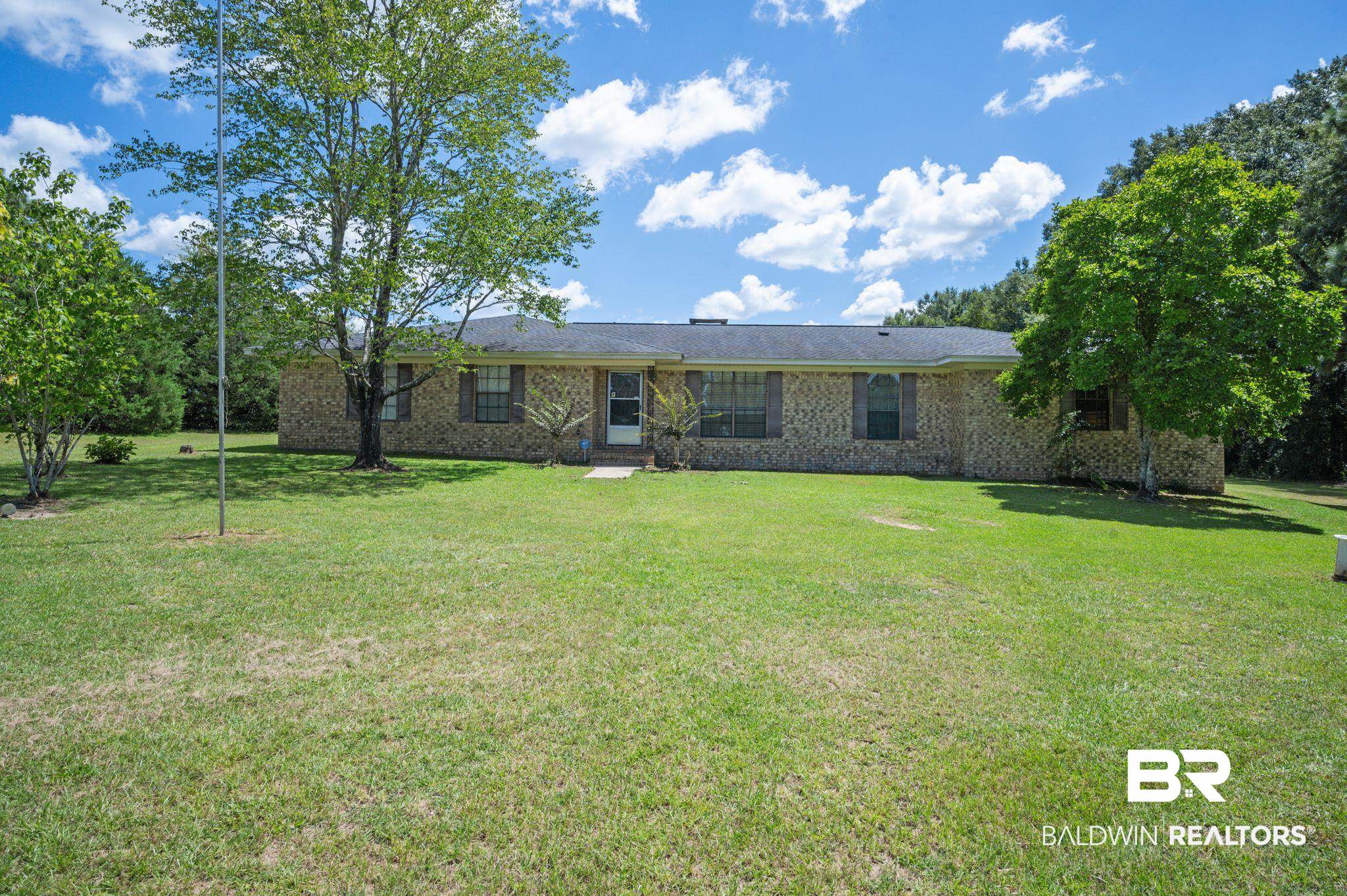 15880 Pine Grove Rd Extension West Bay Minette, AL 36507 - Photo 2 of 44 Ranch-style home featuring a front lawn