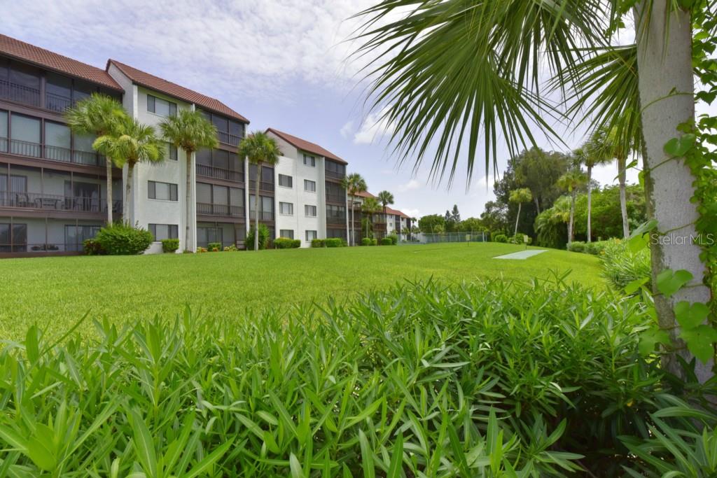 1608 Stickney Point Road, Unit 8102 Sarasota, FL 34231 - Photo 1 of 1 EXTERIOR VIEW - BACK OF CONDO
