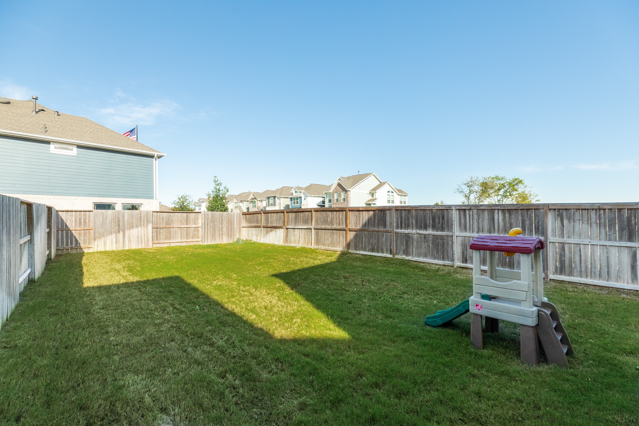 10002 Nectar Path Rosharon, TX 77583 - Photo 28 of 46 This view of the backyard demonstrates the depth of the lot.