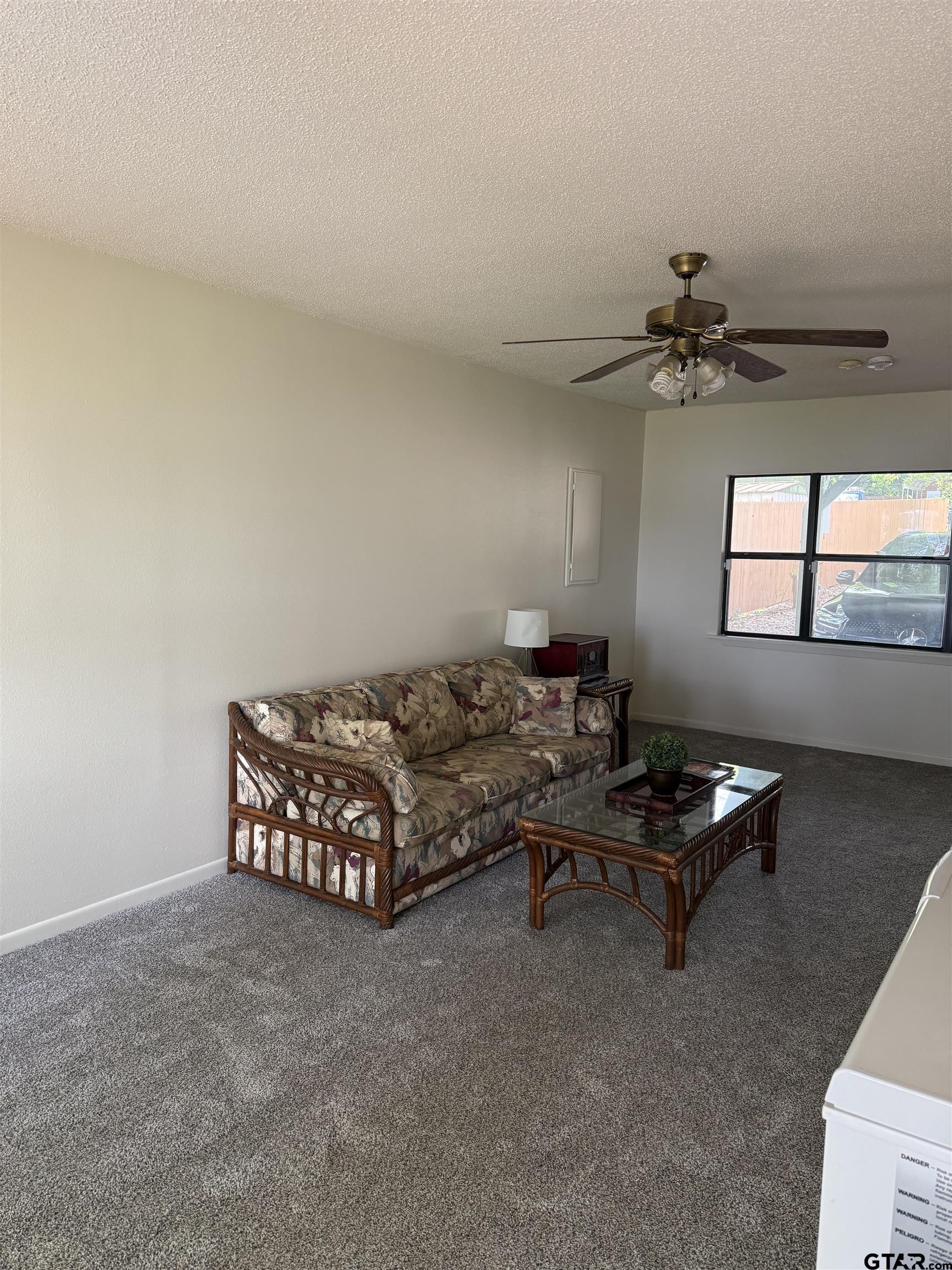 22571 Waterview Circle Flint, TX 75762 - Photo 8 of 41 a living room with furniture and a chandelier