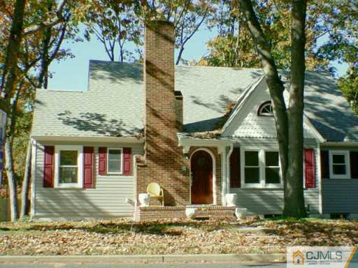 889 Englishtown Road Old Bridge, NJ 08857 - Photo 2 of 8 a front view of a house with garden
