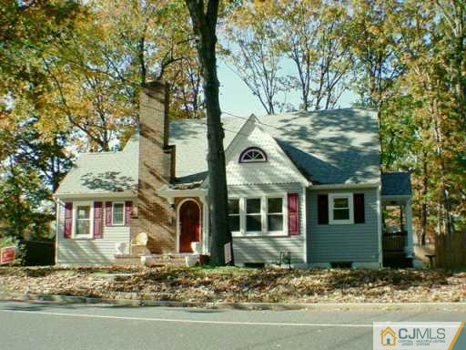 889 Englishtown Road Old Bridge, NJ 08857 - Photo 3 of 8 a front view of a house with garden