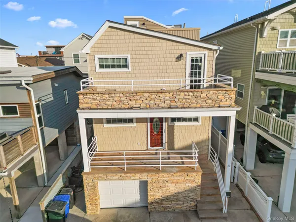 a view of a house with a sink and a refrigerator
