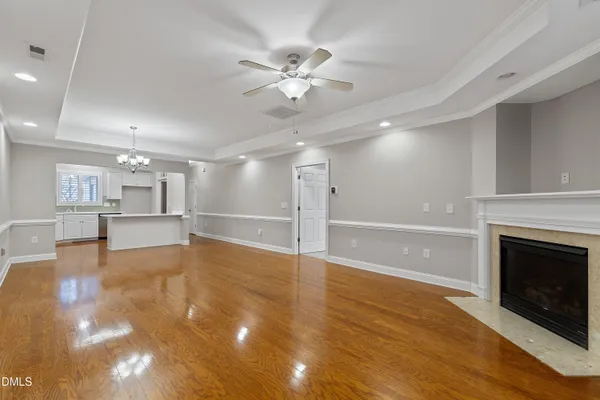 a large kitchen with kitchen island a sink stainless steel appliances and cabinets