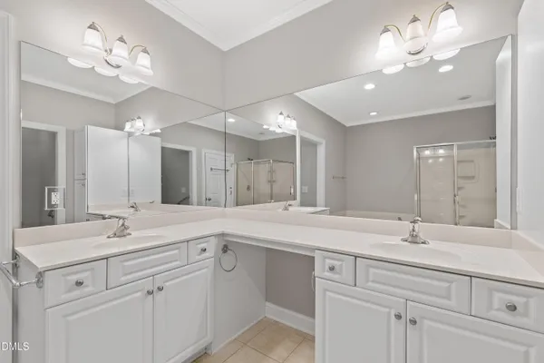 a walk in closet with a shower
