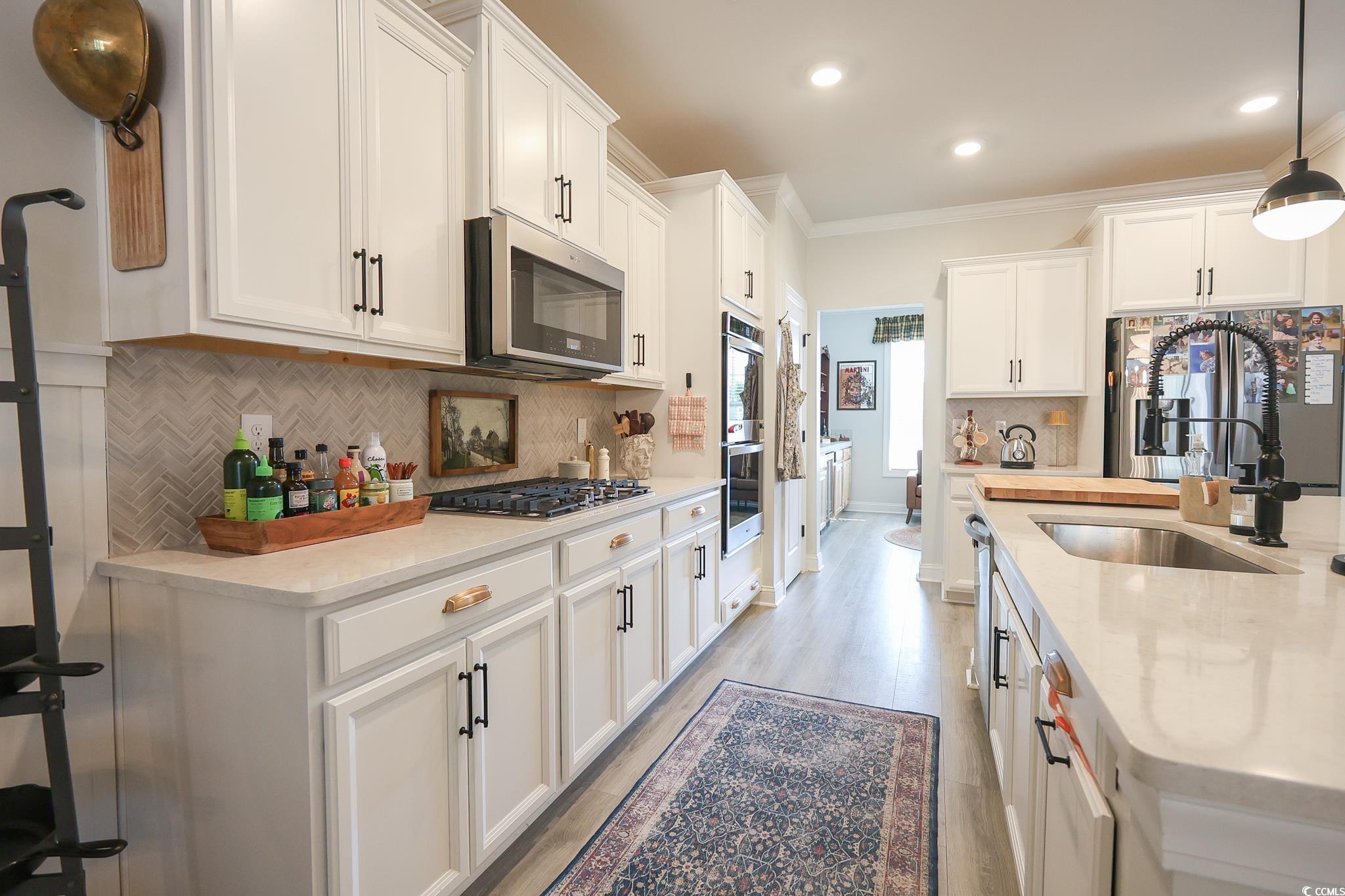 780 Old Murrells Inlet Road Murrells Inlet, SC 29576 - Photo 10 of 39 Kitchen with white cabinetry, stainless steel appl