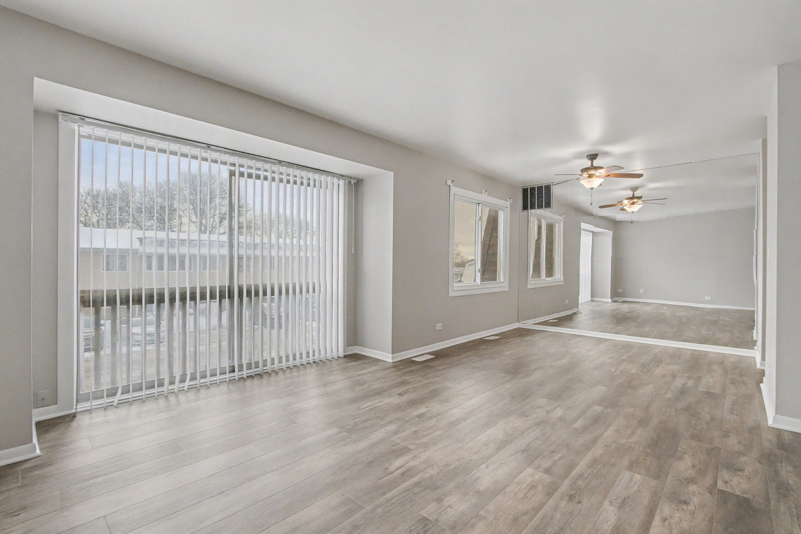 2932 Roberts Drive, Unit 7 Woodridge, IL 60517 - Photo 4 of 28 a view of an empty room with a window